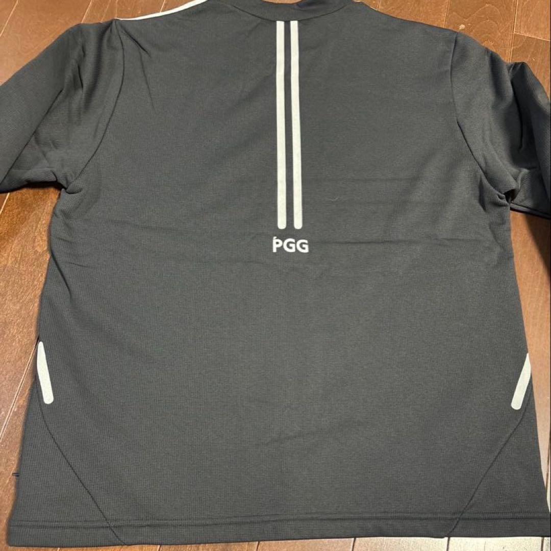 パーリーゲイツPGGストレッチダンボール裏起毛モックネックブラックサイズ5